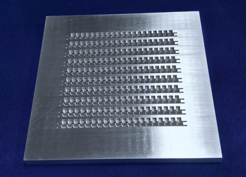Aluminium plate with precision-milled slots — CNC machining