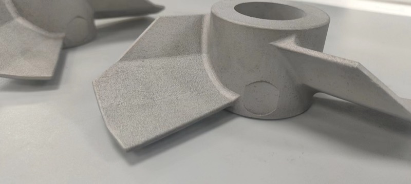 Close-up of the sintered metal powder surface of an SLM-printed impeller — More projects