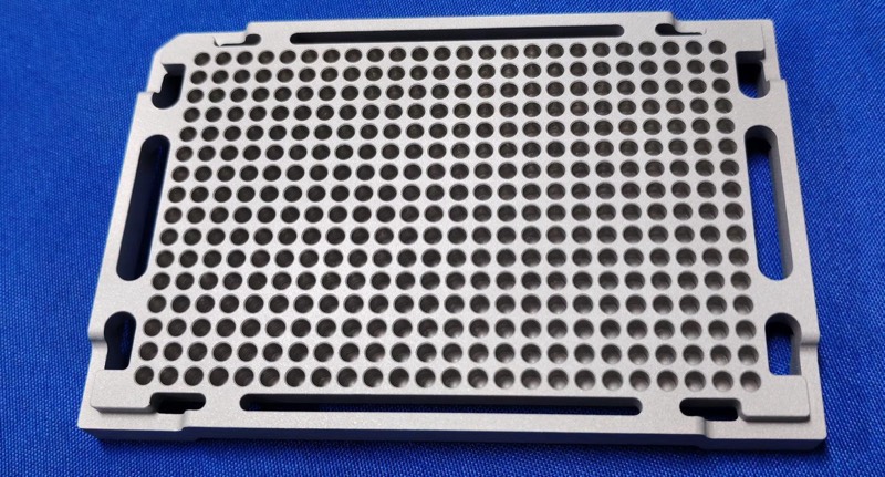 Grey SLS/MJF perforated grid plate — More projects