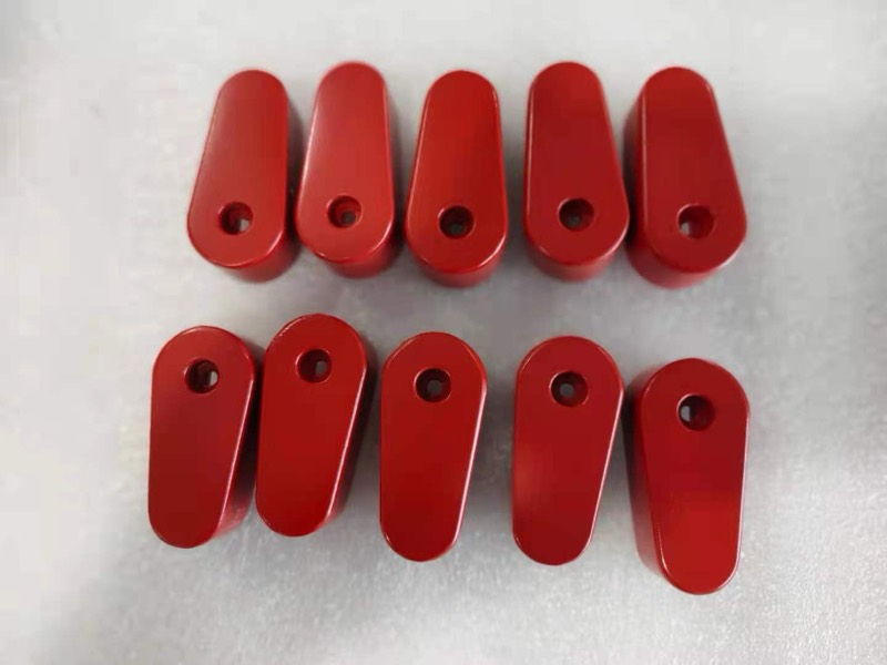 Glossy red painted vacuum-cast PU levers — Vacuum casting
