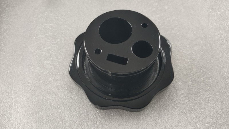 Glossy black vacuum-cast lobed knob housing — Vacuum casting